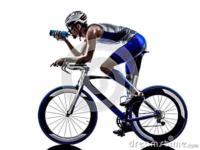 Man triathlon iron man athlete cyclist bicycling drinking Stock Photo