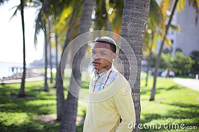 Man in a tropical Miami setting Stock Photo