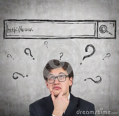 Man is trying to find some answers in the internet. Stock Photo