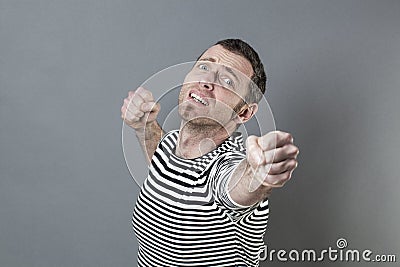 Man trying to succeed he can do it Stock Photo