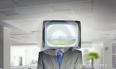 Man with TV instead of head . Mixed media . Mixed media Stock Photo