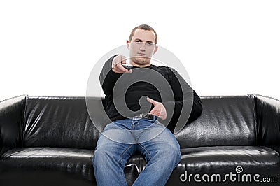 Man with tv remote control Stock Photo