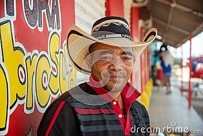 Man with typical Colombian hat in a town on the banks of the Magdalena river. Colombia. Editorial Stock Photo