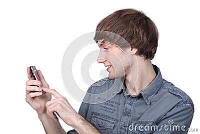 Man typing on his phone Stock Photo