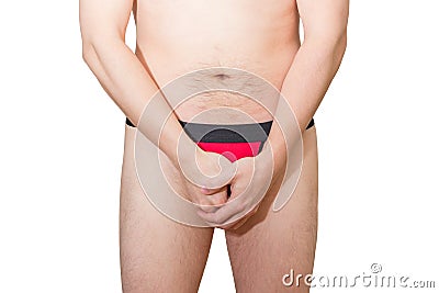 Man in underwear holding/hiding/protecting his penis Stock Photo