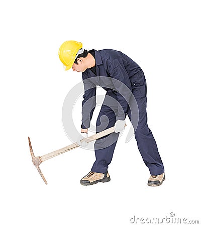 Man in uniform hold old pick mattock that is a mining device Stock Photo