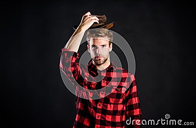 Man unshaven cowboy black background. Masculinity and brutality concept. Adopt cowboy mannerisms as a fashion pose Stock Photo