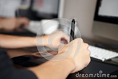 Man uses graphics tablet. Stock Photo