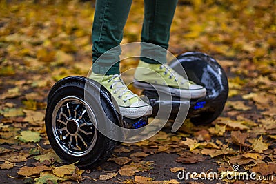 Man is using the black hoverboard Stock Photo