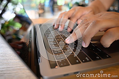 Man using a computer to work Laptop, Computer Desktop PC Human Hand on Office Stock Photo