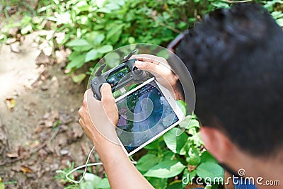 Man using DJI mavic drone Editorial Stock Photo