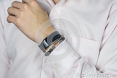 Man using his smart watch app. Close up of hands and fancy luxury watch for men Stock Photo