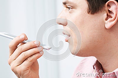 Man Using Internet Voice Search Technology On Mobile Phone Stock Photo