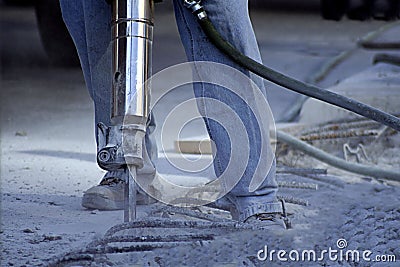 Man Using Jack Hammer Stock Photo