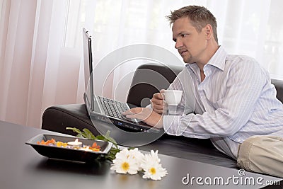 Man using laptop Stock Photo