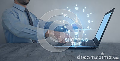 Man using laptop. Clock. Shopping time. Online shopping Stock Photo