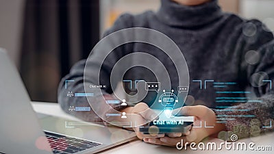 A man using a laptop computer chatting with an intelligent artificial intelligence asks for the answers he wants. Smart assistant Stock Photo