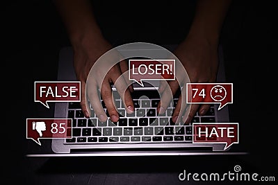 Man using laptop and icons with offensive messages, closeup. Cyber bulling concept Stock Photo