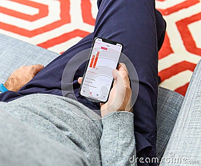 Man using latest iPhone XS unboxing display steps health app Editorial Stock Photo