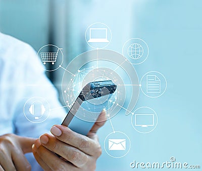 Man using mobile payment, holding circle global and icon customer network connection, Omni Channel Stock Photo