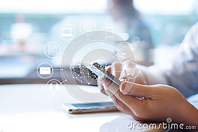 Man using mobile payments, holding circle global and icon customer network connection Stock Photo