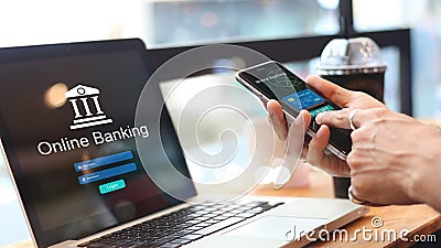 Man using online banking with credit card on touch screen device Stock Photo