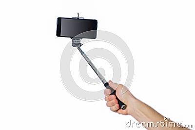 Man using a selfie stick Stock Photo