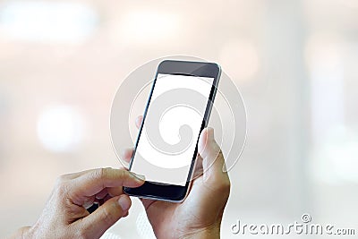 Man using smartphone on blur background. Stock Photo