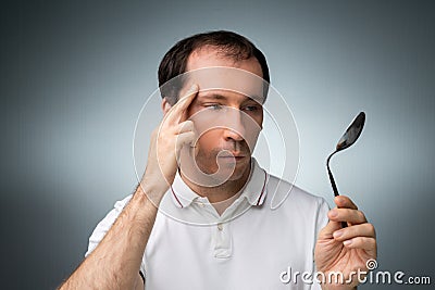 Man Using Telekinetic Powers Stock Photo