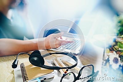 Man using VOIP headset with digital tablet computer docking smart keyboard, concept communication, it support, call center and cu Stock Photo