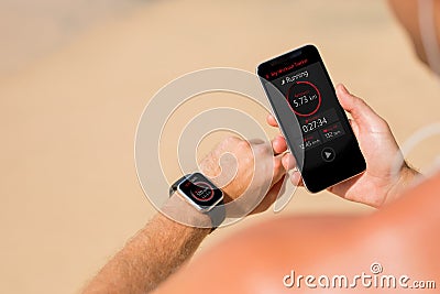 Man using wearable tech during fitness workout Stock Photo