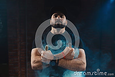 Man vaping an electronic cigarette Stock Photo