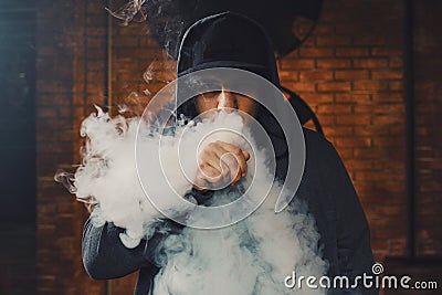 Man vaping an electronic cigarette Stock Photo