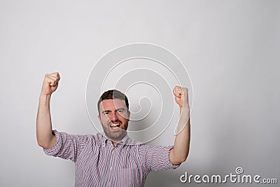 Man very happy for a victory Stock Photo