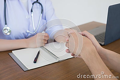 Man visiting doctor for routine check-up. Stock Photo