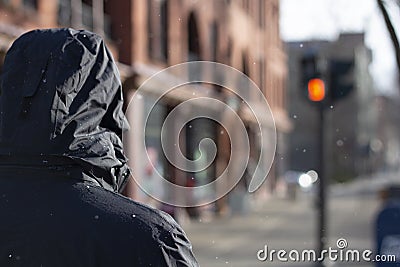 Man walking down the Street Stock Photo