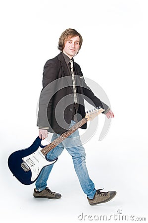 Man walking with electro guitar Stock Photo