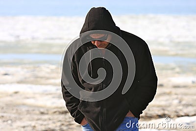 Man Walking with Head Down Stock Photo