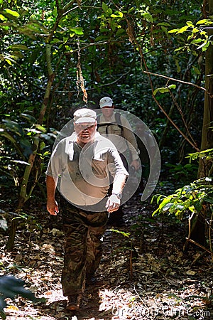 Man walking on the jungle Stock Photo