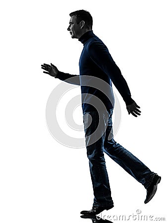 Man walking side view silhouette full length Stock Photo