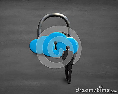 Man walking toward cloud shape lock Stock Photo