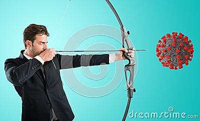 Man want to destroy the covid-19 coronavirus with bow and arrow Stock Photo