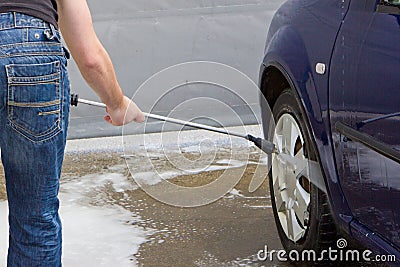 Man washing car Stock Photo