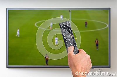 Man is watching football match on TV Editorial Stock Photo