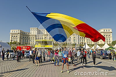 Man waving giant Romanian flag Editorial Stock Photo