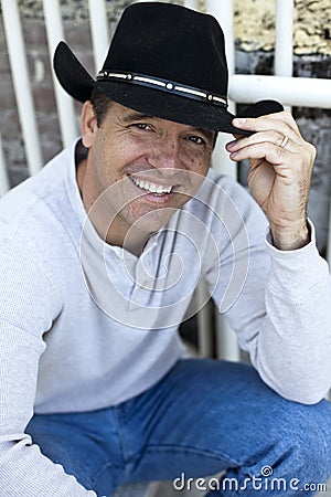 Man wearing cowboy hat Stock Photo