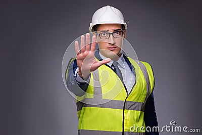 The man wearing hard hat and construction vest Stock Photo