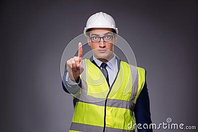 The man wearing hard hat and construction vest Stock Photo