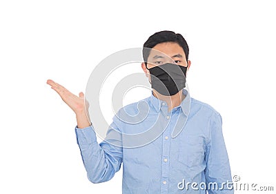 A man wearing a mask makes an explanatory gesture in front of a white background Stock Photo