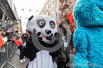 Man wearing a panda mask at the 25th Annual Chinese Lunar New Year Parade and Festival Editorial Stock Photo